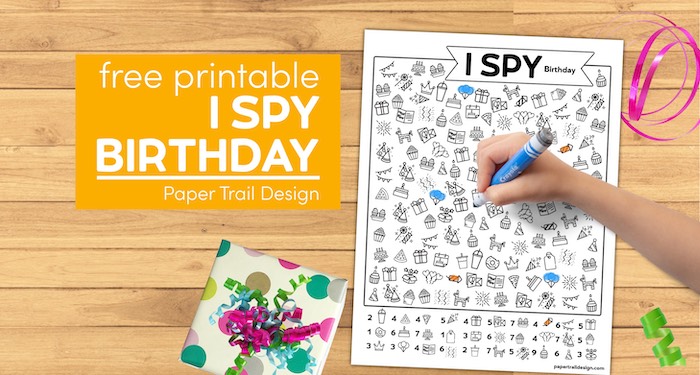 Kids I spy activity page with kids hand holding marker and gift over with text overlay- free printable I spy birthday
