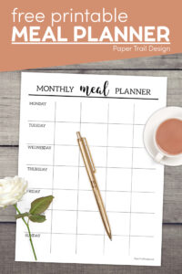Monthly meal planner with enough boxes to plan a month with text overlay- free printable meal planner