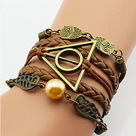 Harry Potter deathly hallows, owl, and golden snitch discreet bracelet is one of the best Harry Potter gifts.