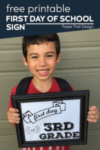 Boy holding first day of 3rd grade sign with text overlay- free printable first day of school sign