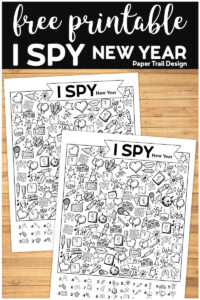 I Spy New Year activity page on a wood background with text overlay- free printable I Spy New Year. 