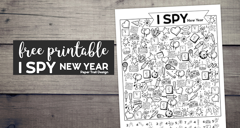 I Spy New Year activity page on a wood background with text overlay- free printable I Spy New Year.