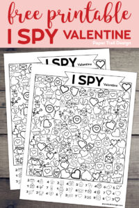 Two Valentine I Spy games on wood background with text overlay- free printable I Spy Valentine