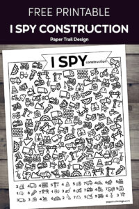 construction themed I spy game on wood background with text overlay- free printable I spy construction