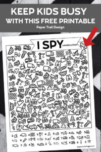 Construction themed I spy activity on black and white background with text overlay- keep kids busy with this free printable