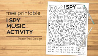 I spy music themed activity on wood background with pen and pencil and text overlay- free printable I spy music activity