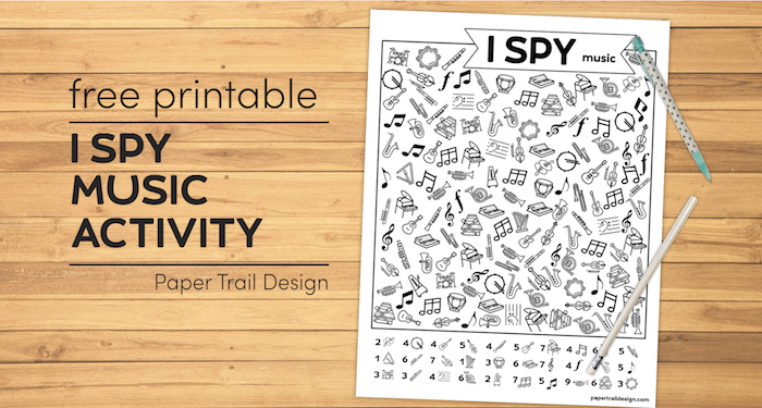 I spy music themed activity on wood background with pen and pencil and text overlay- free printable I spy music activity