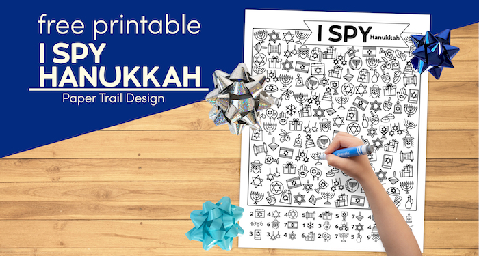 Hanukkah printable with blue ribbons and kids hand holding a marker with text overlay- free printable I spy Hanukkah