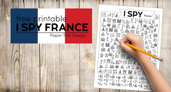 I spy France activity page with kids hand holding pencil with text overlay- free printable I spy France